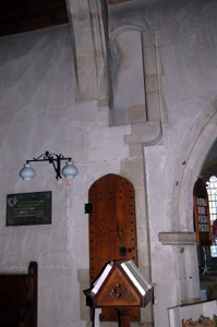 The door and doorway to the rood screen on the south side of the chancel January 2011